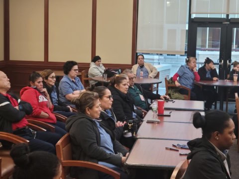 Union members attending a meeting at UFCW Local 371 conference room.